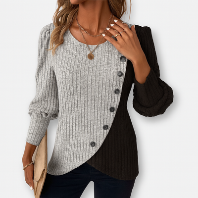 Färgbloxad tröja med asymmetrisk skärning – Slående stil möter vardagskomfort